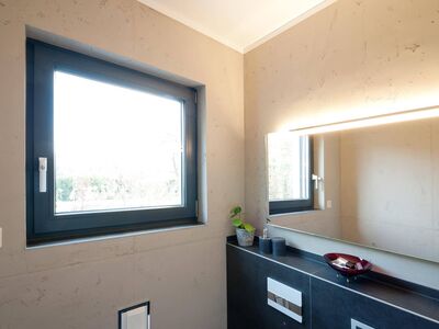Fugenlose Oberfläche im ganzen Bad in Betonoptik